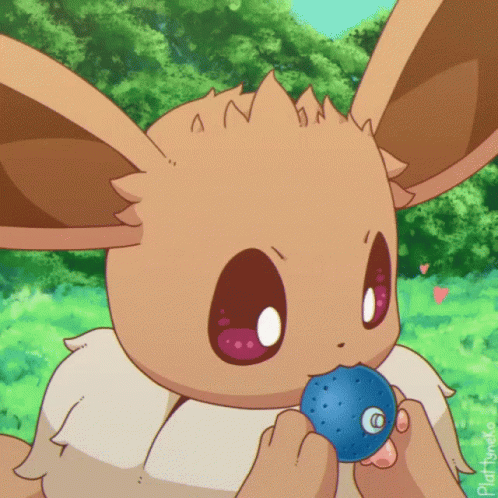 Gif of an Eevee eating a berry.
